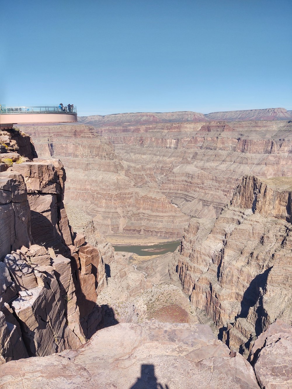 people walking on brown rocky mountain during daytime