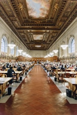 brown wooden tables and chairs inside building