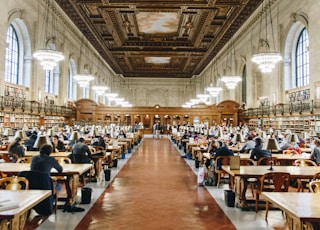 brown wooden tables and chairs inside building