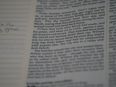 A close-up of an open book with handwritten notes.