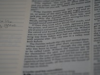 A close-up of a biology textbook and notes.