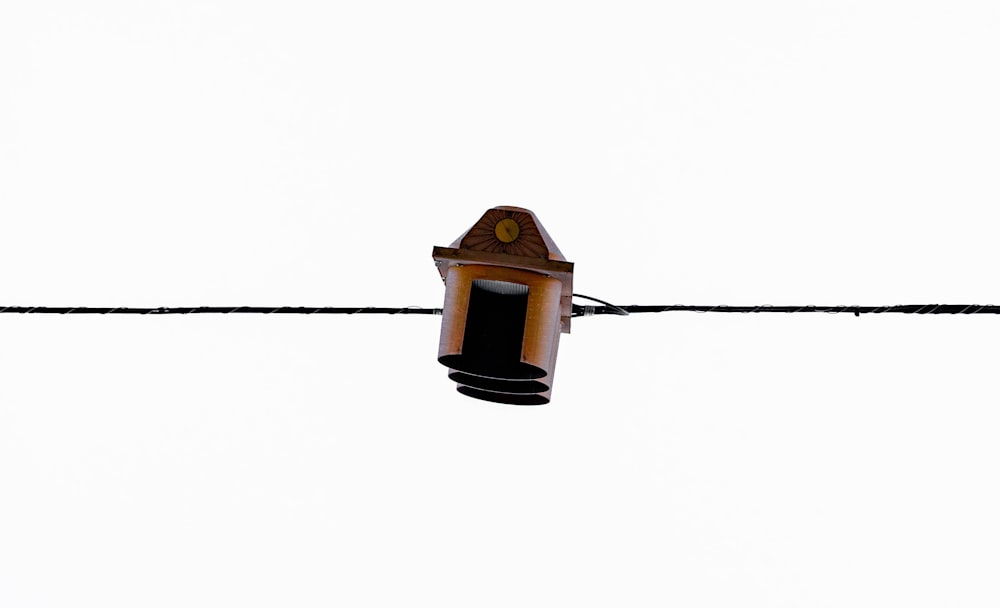 black and brown lantern on white background