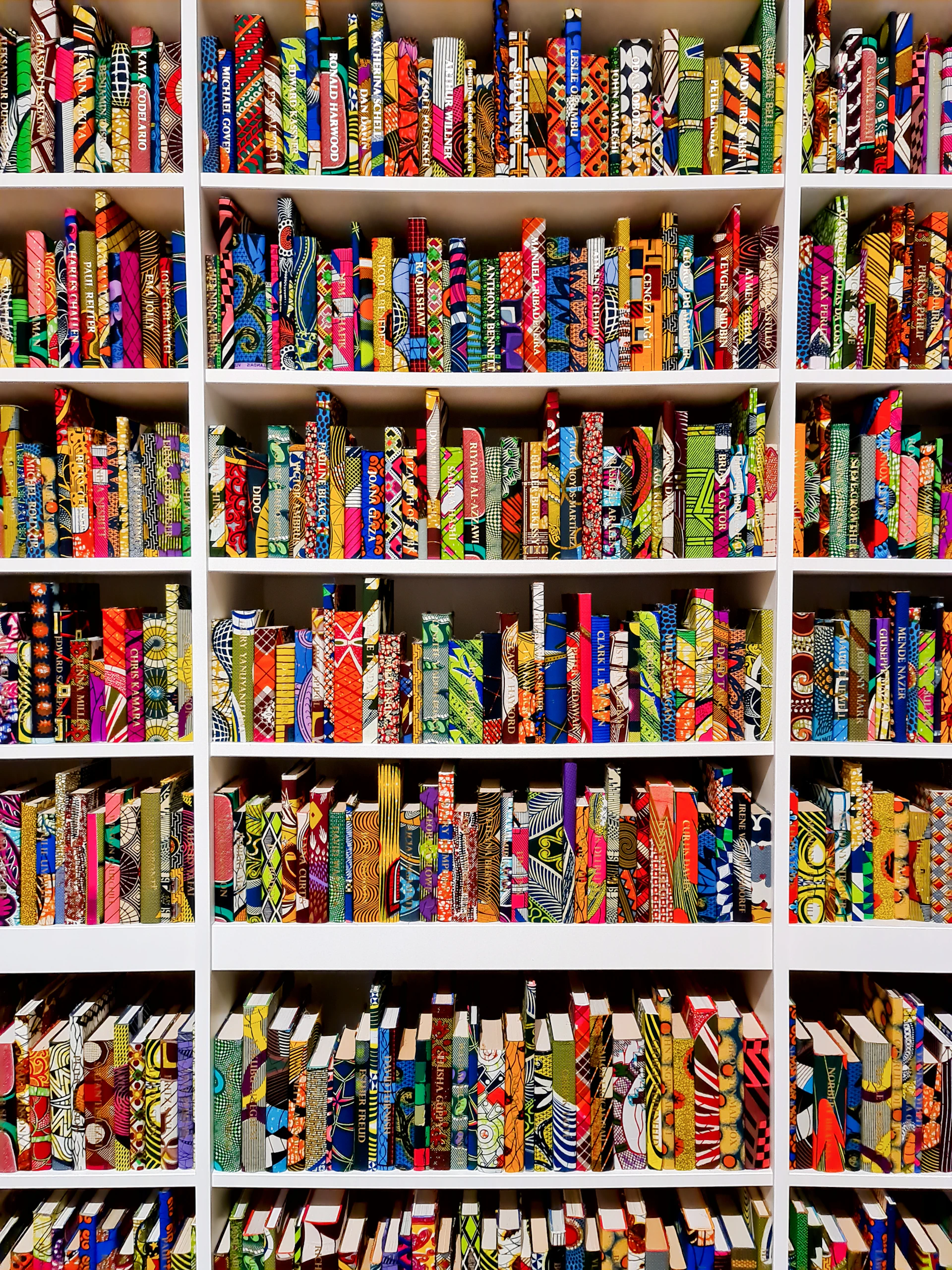 woman wearing yellow long-sleeved dress under white clouds and blue sky during daytime