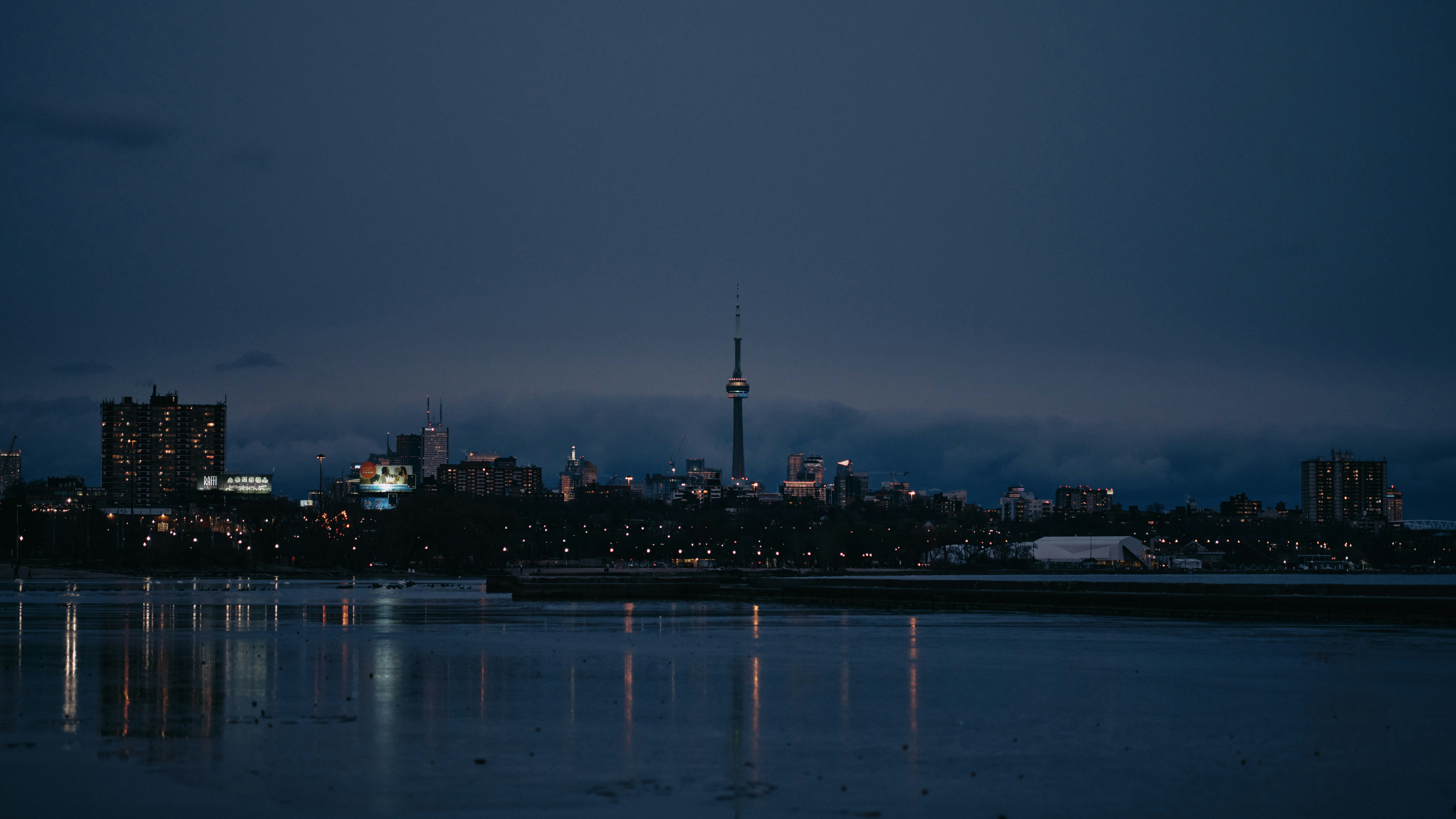 city skyline during night time