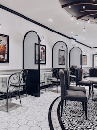 Elegant dining area with modern Italian decor and soft lighting.