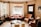 A warm, inviting living room with soft lighting and comfortable seating.