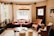 A cozy living room featuring stylish furniture and elegant home decor accents.