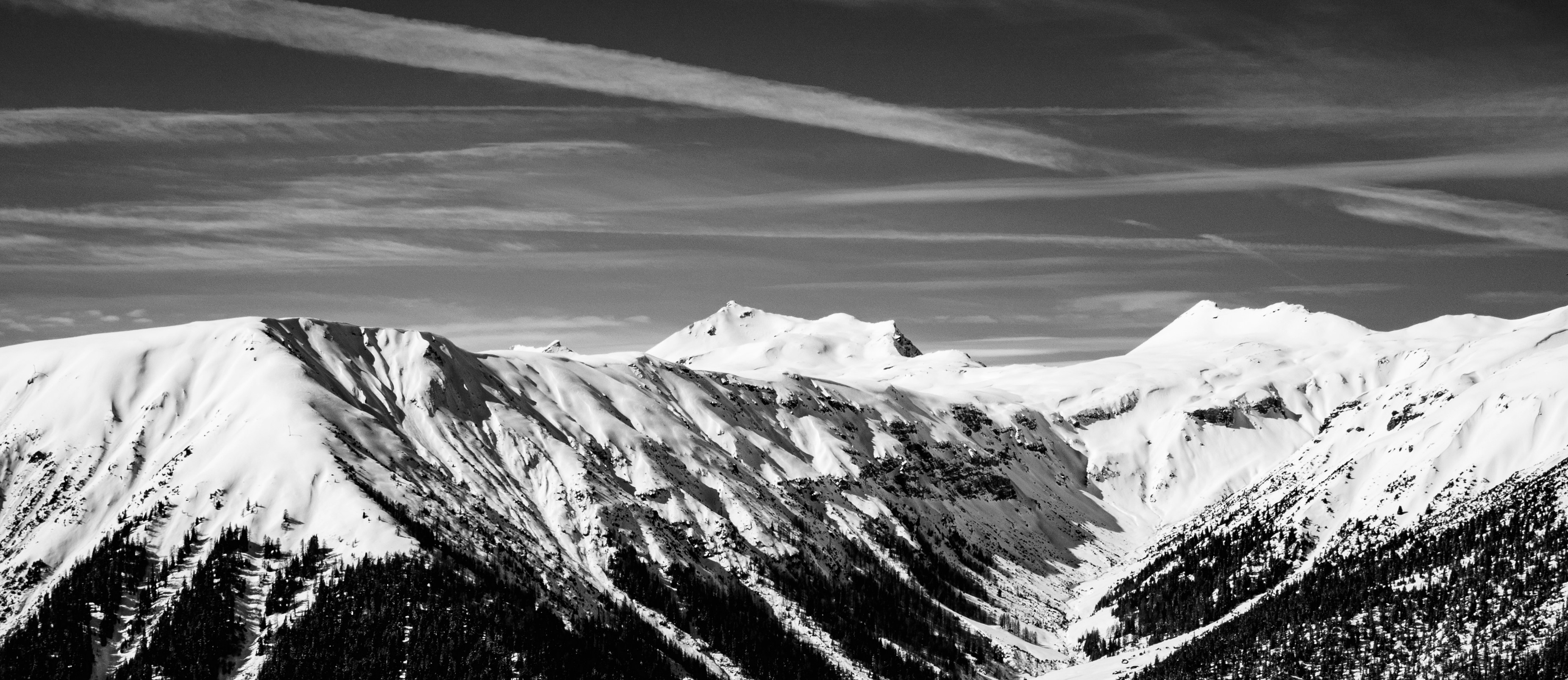 grayscale photo of snow covered mountain
