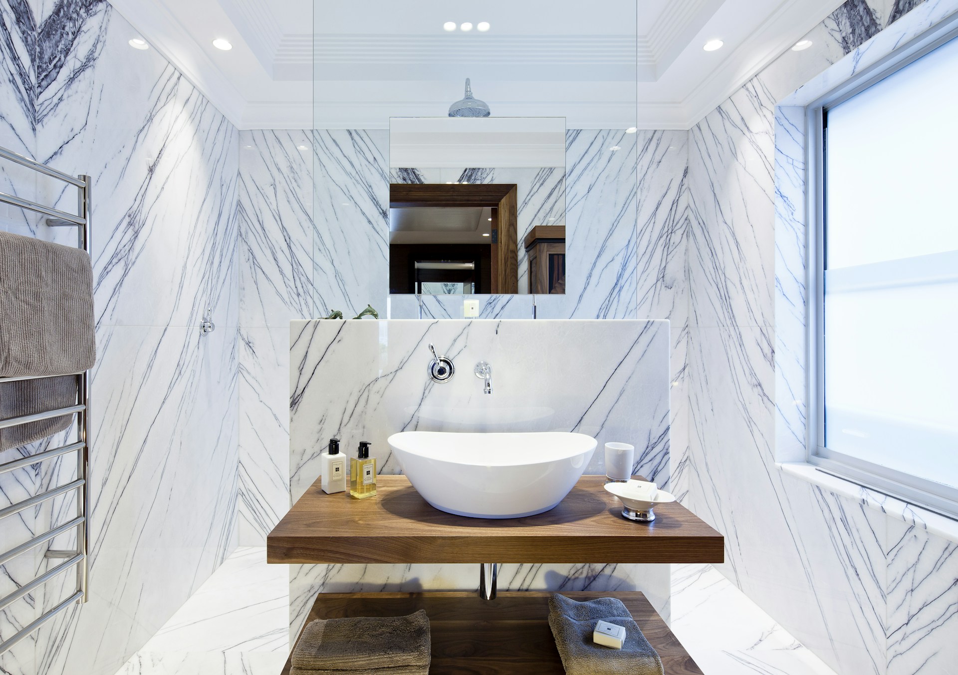 white ceramic sink on brown wooden table