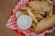 fried food on red and white checkered plate
