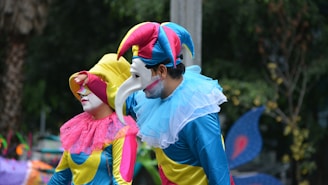 Fred and Leslie dressed in quirky costumes at a school play