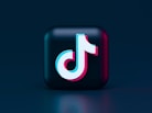 red and whites tik tok logo