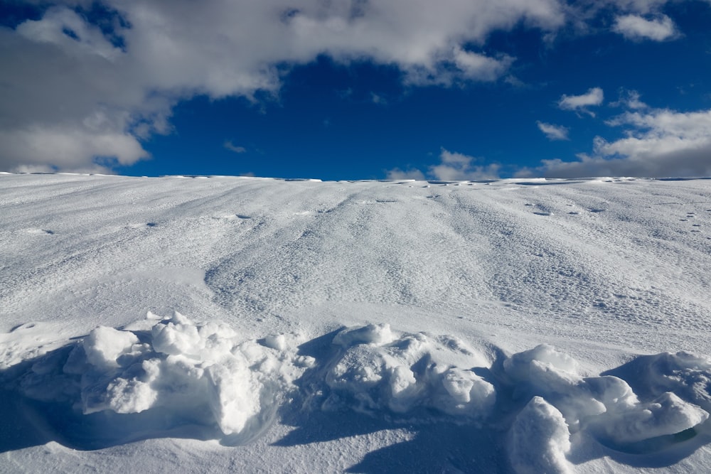 snow covered mountain under blue sky during daytime