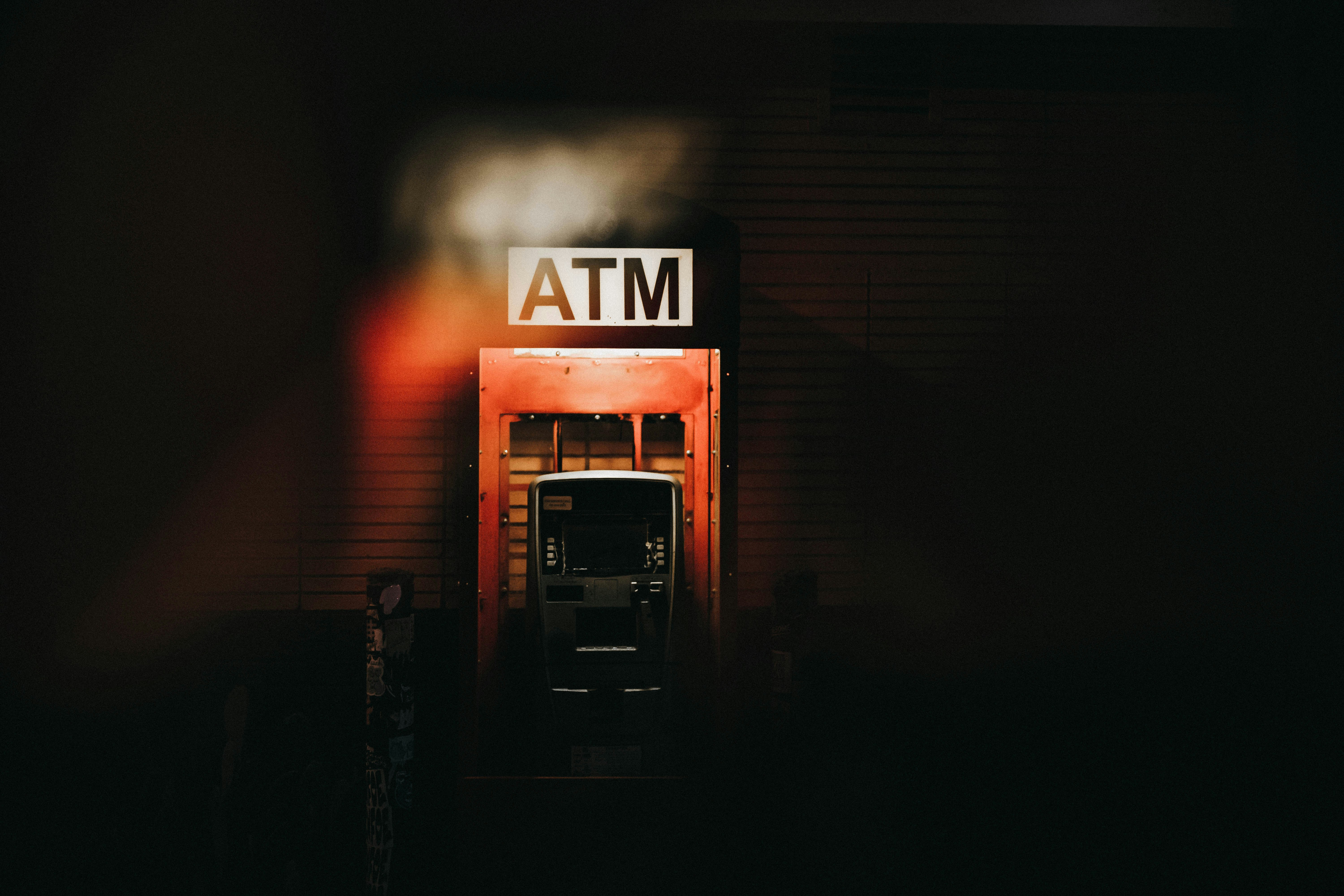 Shot of an ATM machine at night.