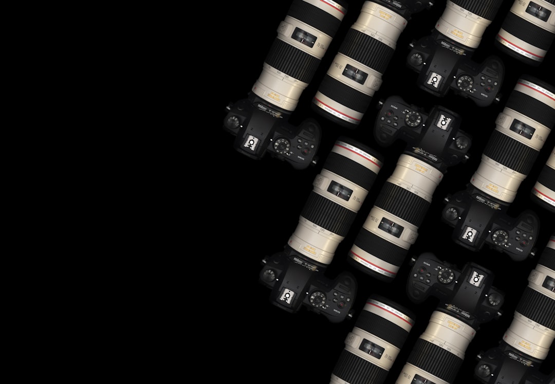 black and yellow dslr camera lens,