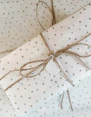 white and pink polka dot gift wrap