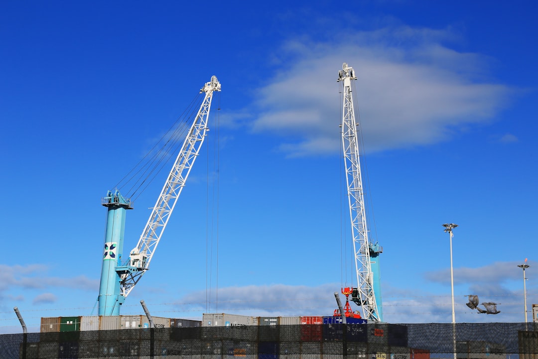 crane under blue sky during daytime