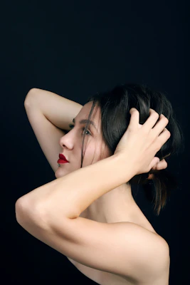 topless woman with red lipstick