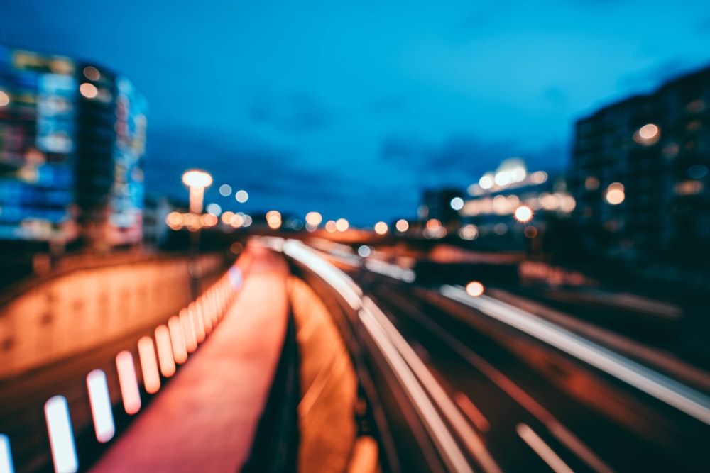 time lapse photography of city lights during night time