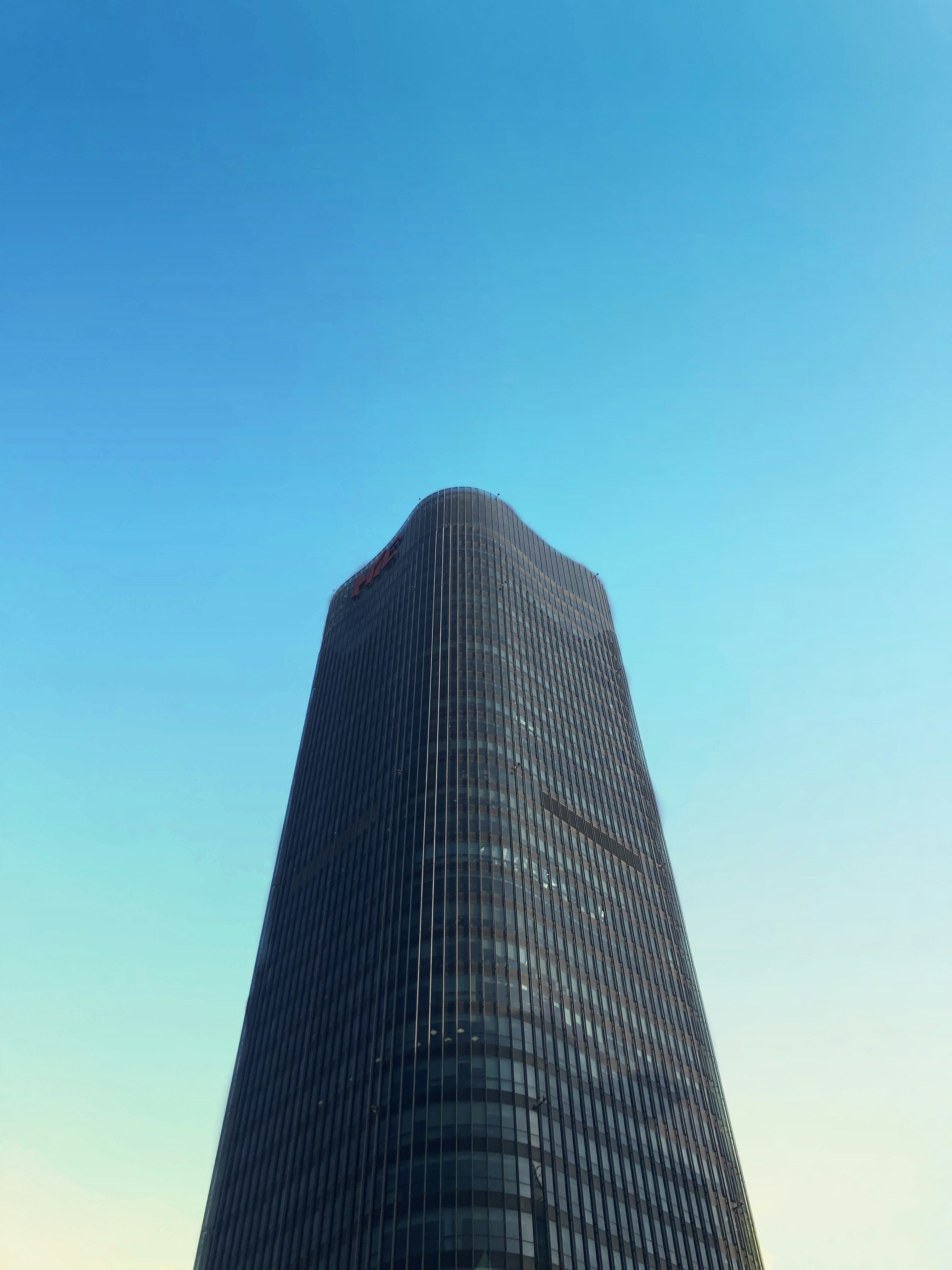 black and white building under blue sky during daytime