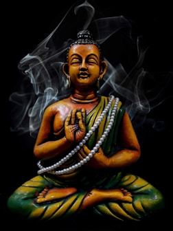 woman in green and yellow dress with white wings