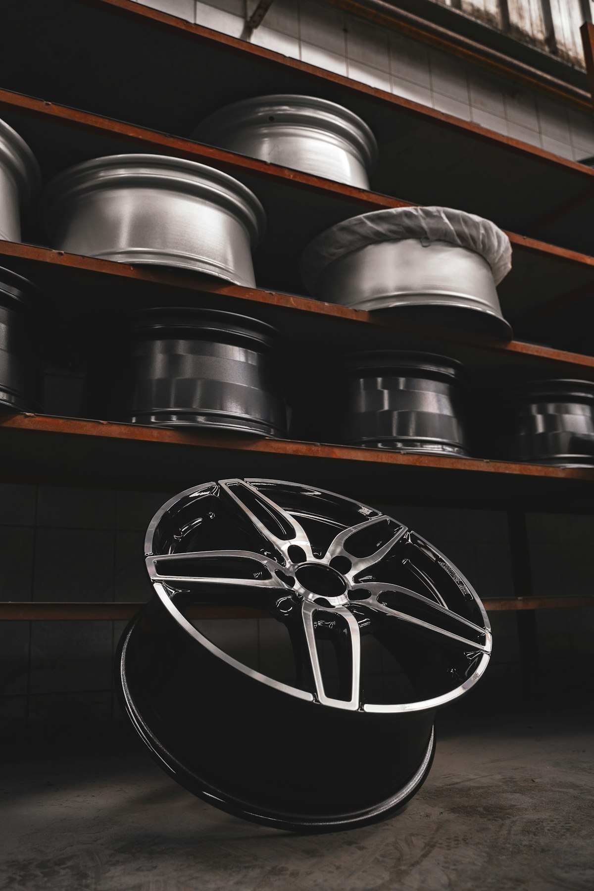 Forged performance wheel on display in a workshop