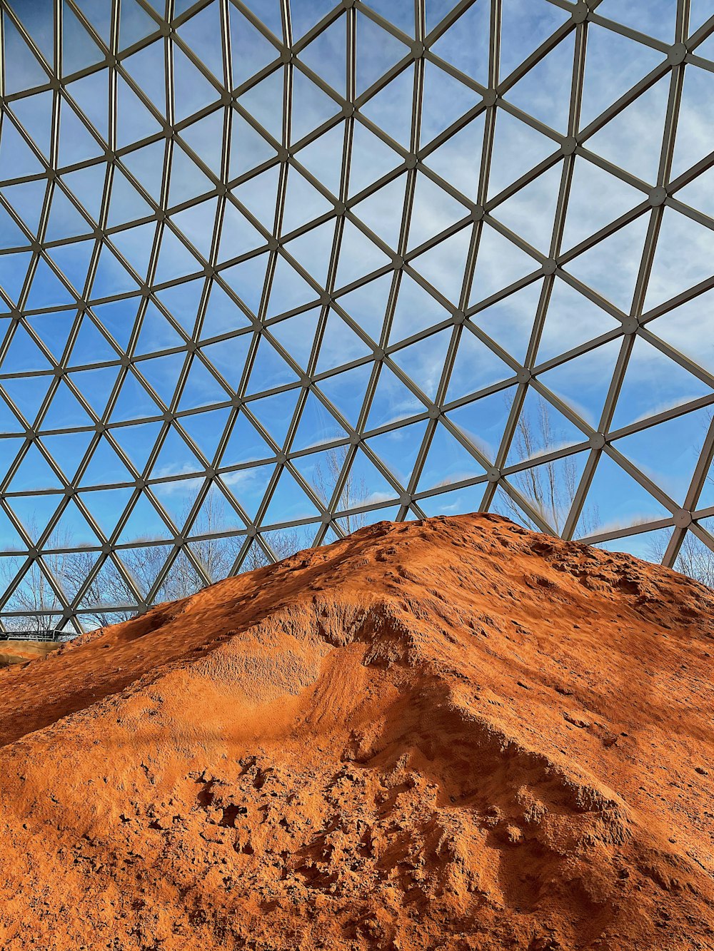 brown rock formation under blue sky during daytime