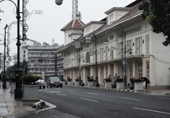 white concrete building near road during daytime