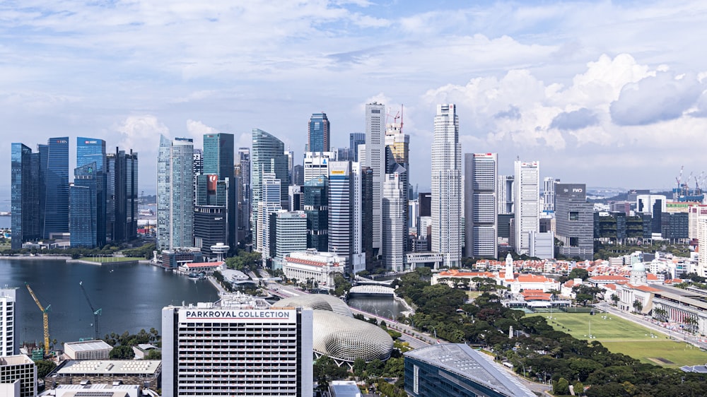 city buildings near body of water during daytime