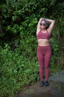 woman in pink bikini standing on water