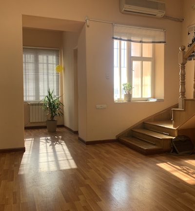 brown wooden parquet floor near white wooden door