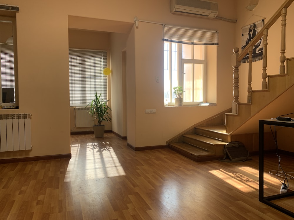 brown wooden parquet floor near white wooden door