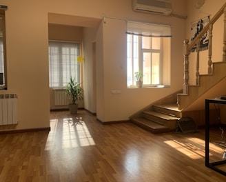 brown wooden parquet floor near white wooden door