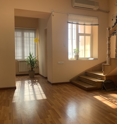 brown wooden parquet floor near white wooden door