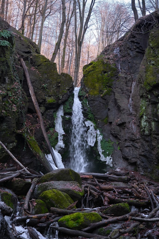 water falls in the middle of rocky mountain in Parád Hungary