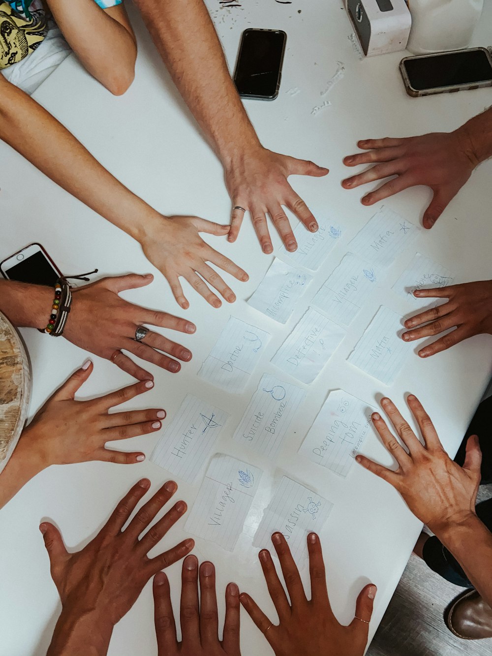 person holding white printer paper