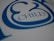 A close-up view of stylized blue text on a white surface, featuring the word 'CHILD' with decorative elements surrounding it.