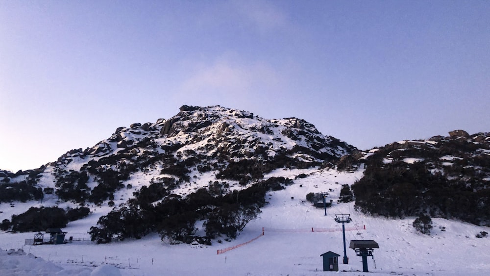 snow covered mountain during daytime