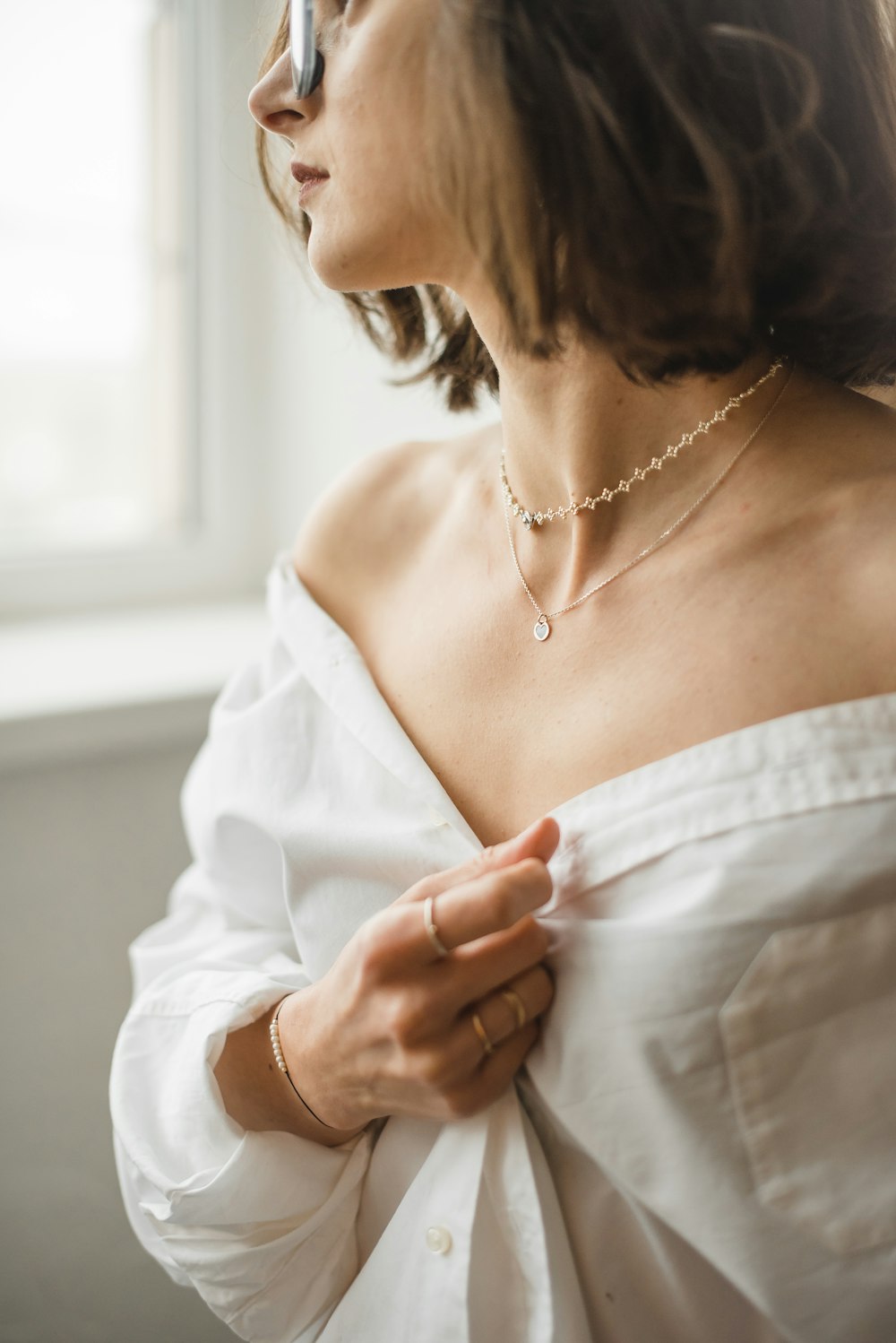 woman in white off shoulder dress