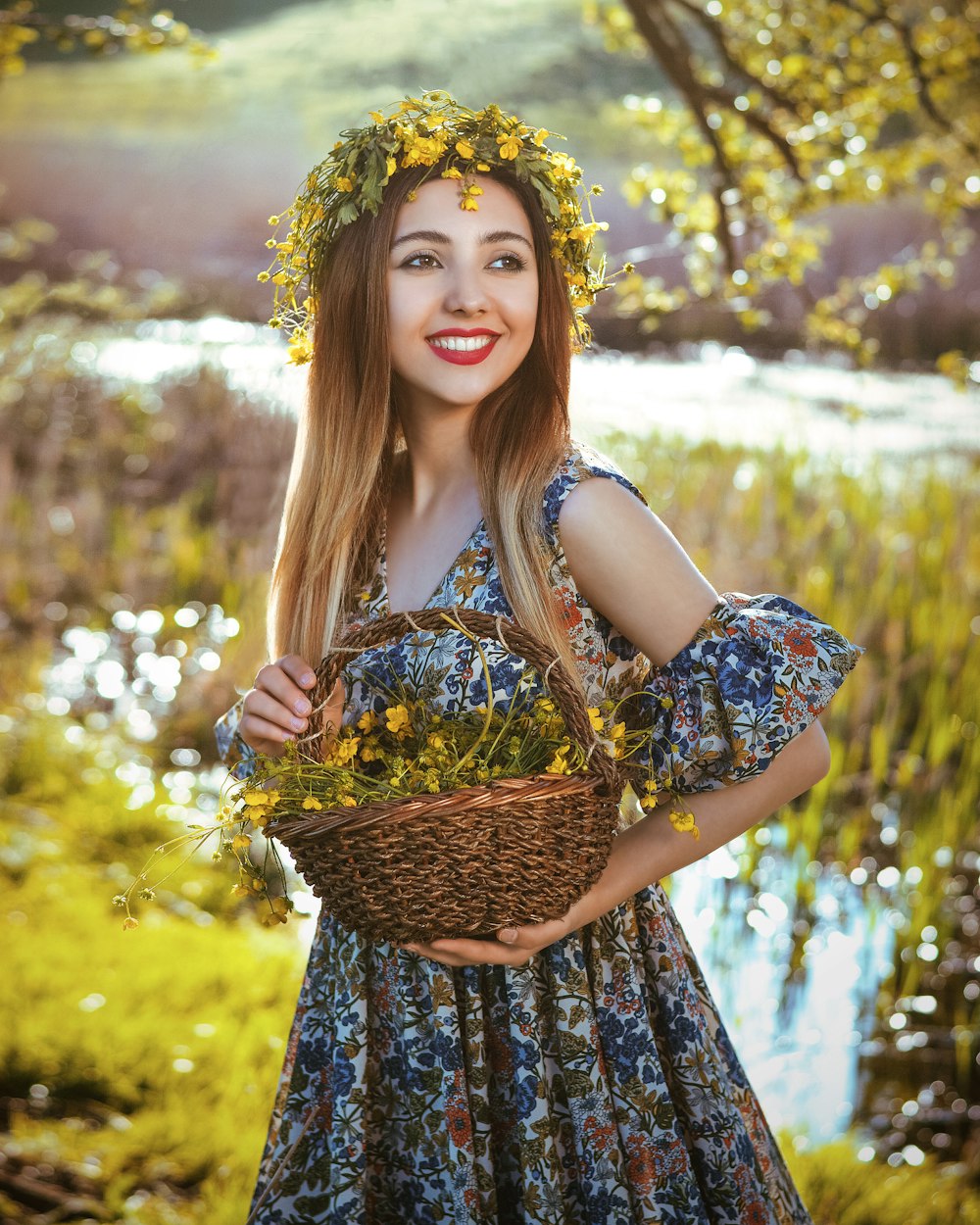 woman in blue and white floral dress with yellow flower crown