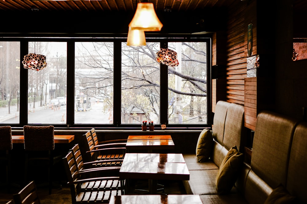 brown wooden table with chairs