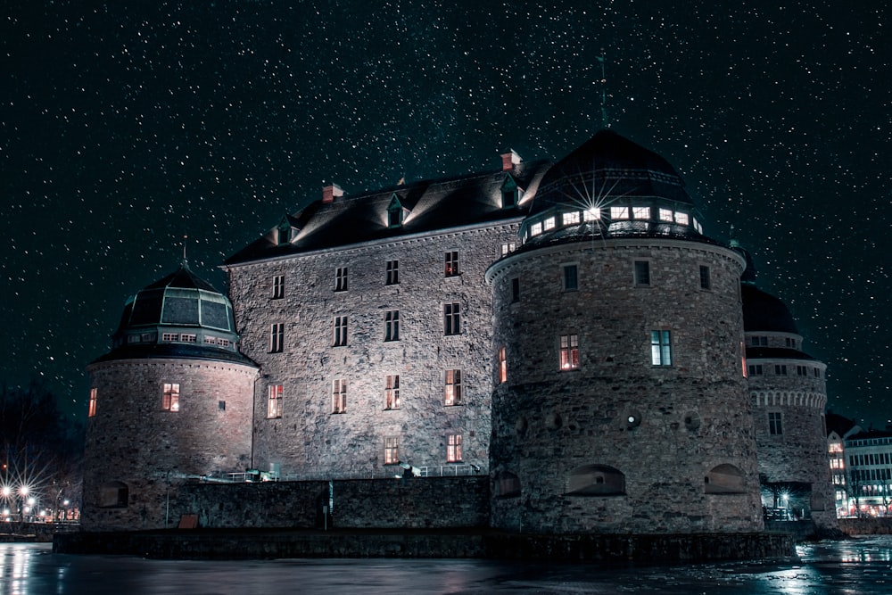 gray concrete castle during night time