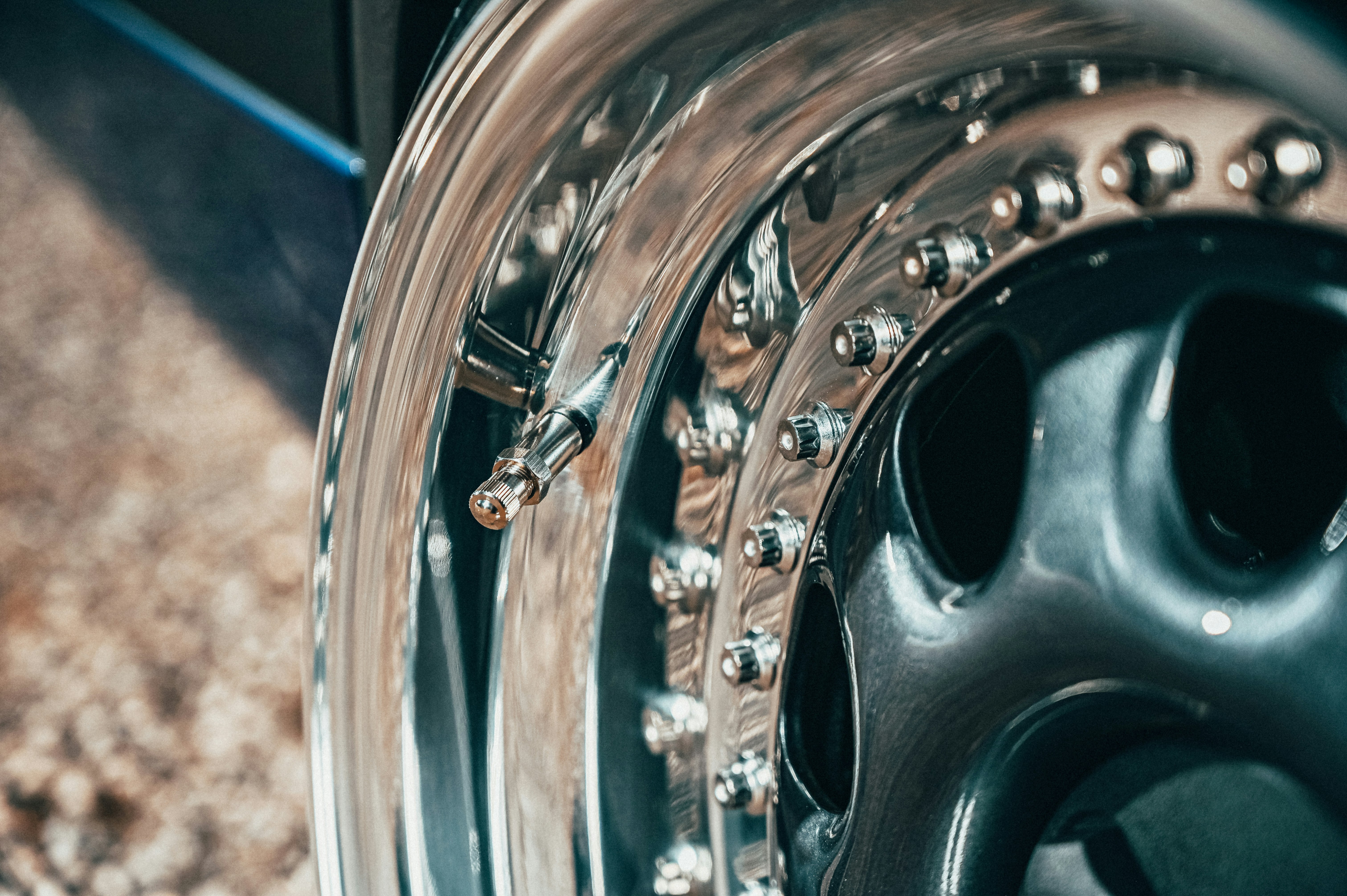 silver bicycle wheel on brown sand