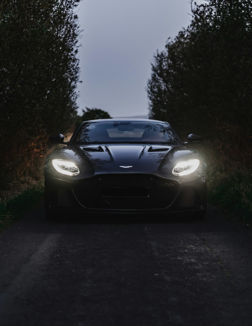 black bmw m 3 on road during night time