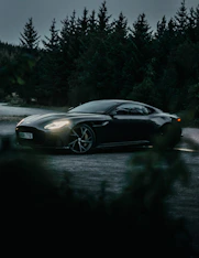 silver porsche 911 on road