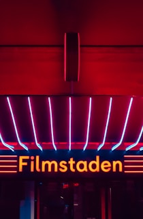 red and yellow open neon signage
