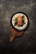 brown wooden round plate with food