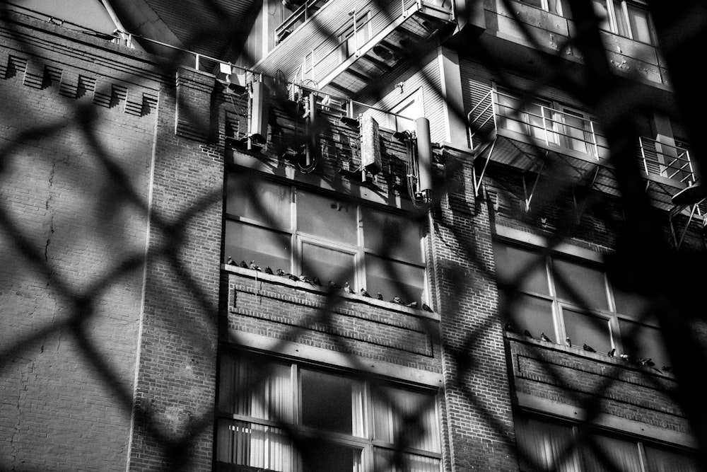 a black and white photo of a tall building