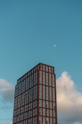 black high rise building under blue sky during daytime