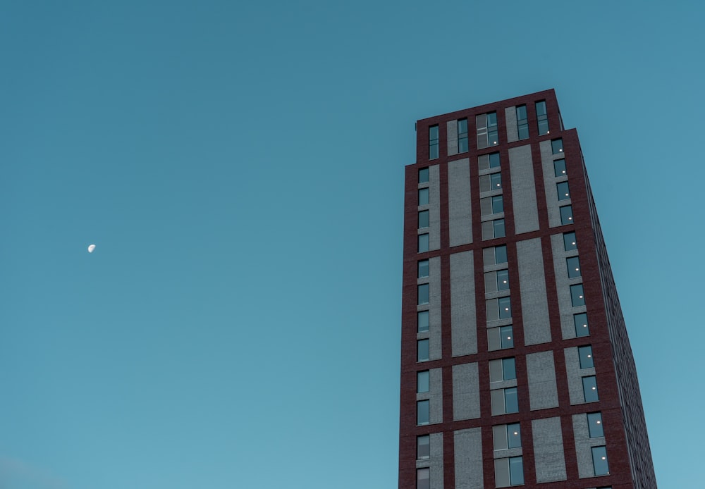 red and black building under blue sky